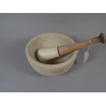 A Pestle and Mortar.