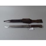 A German Bayonet in Leather Scabbard the