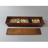 A Cased Set of Nine Spot Dominoes