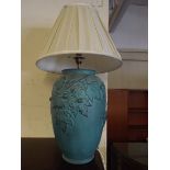 A Ceramic Table Lamp with Moulded Leaf D