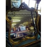 An Ornate Gilt Farmed Easel Mirror.