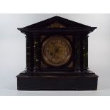 A Wooden Faux Marble Mantle Clock