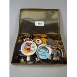A Decorated Tin containing Badges etc