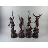 Two Pairs of Bronzed Spelter Figures