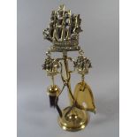 A Brass Companion Set with Galleon Motif.