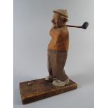 A Mid 20th Century American Carved Wooden Figure of A Golfer.