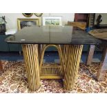 A Modern Smoke Glass Topped Bamboo Framed Occasional Table.