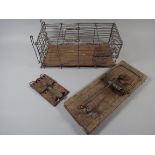 A Collection of Three Rat Traps.