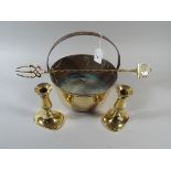 A Brass Jam Kettle, Pair of Brass Candle Sticks and A Brass Toasting Fork.