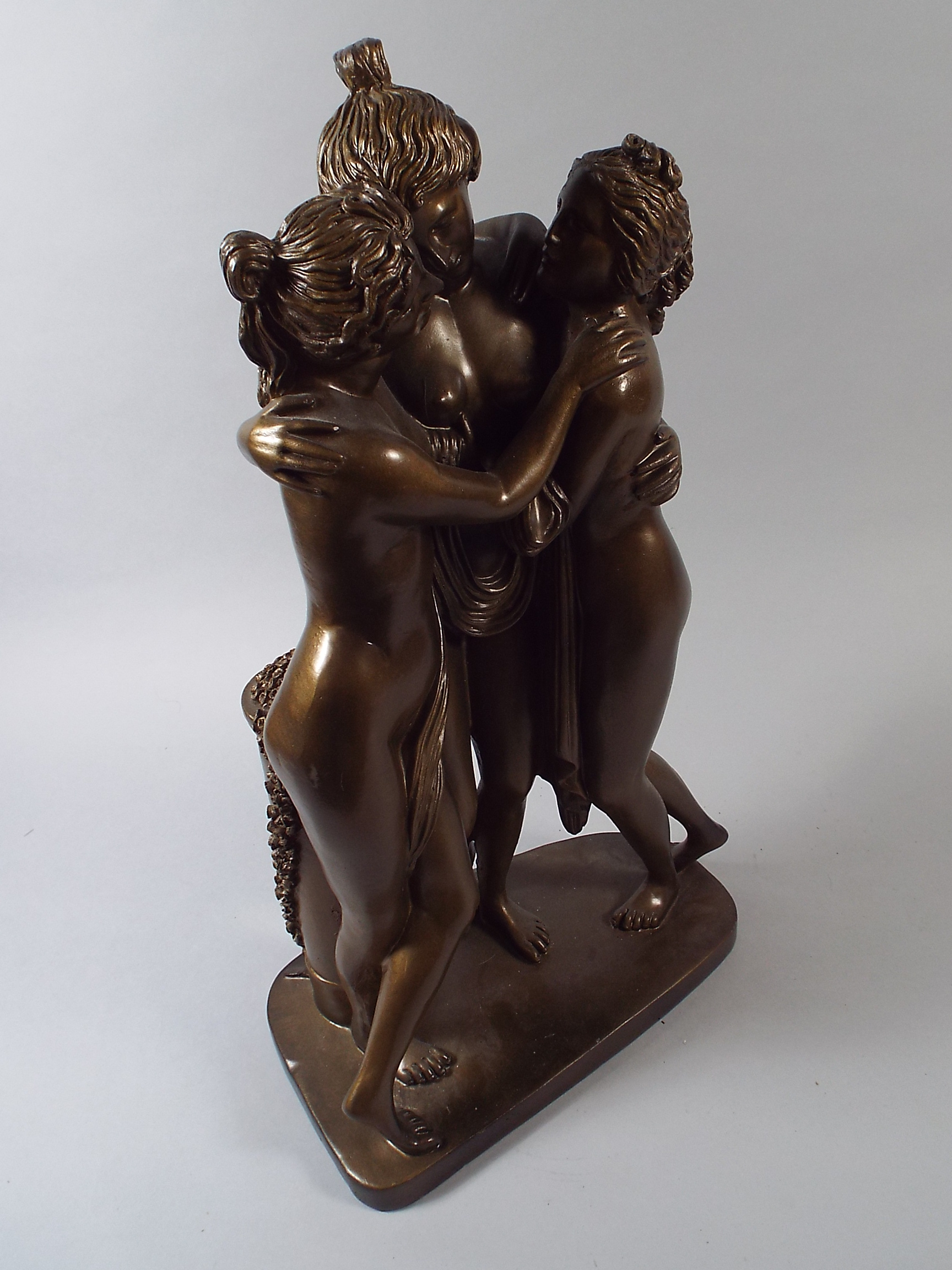 A Cast Resin Bronze Effect Figure of The Three Graces.