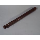 A Turned Wooden Truncheon.