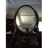 An Edwardian Oval Glass Swing Toilet Mirror