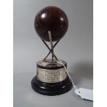 A Cricket Trophy in the Form of Ball on Silver Plated Wickets,