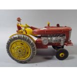 A Vintage Battery Driven Tractor Toy