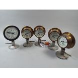 A Set of Four Trent Brass Mounted Pressure Meters and A Similar Example by Griffin & George