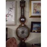 A Rosewood Banjo Barometer by J Callaghan.