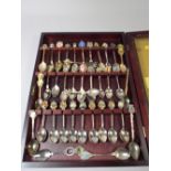 A Collection of Souvenir Teaspoons in Case.