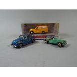 A Collection of Dinky Toy Cars Comprising of A 1953 Austin A40, M.G Midget and A VW De Luxe.