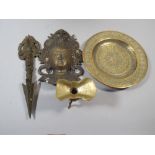 A Collection of Brass Indian Items to Include Spear Head, Mask Etc.