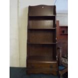 A Modern Oak Waterfall Bookcase with Single Base Drawer.