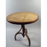 A Cane Top Bent Wood Tripod Table.