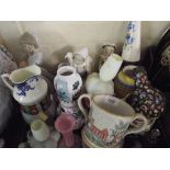 A Collection of China and Glass Ware to Include Figures, Cups and Vases.