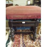 An Oak Stool with Upholstered Top Turned Legs and Carved Stretcher.