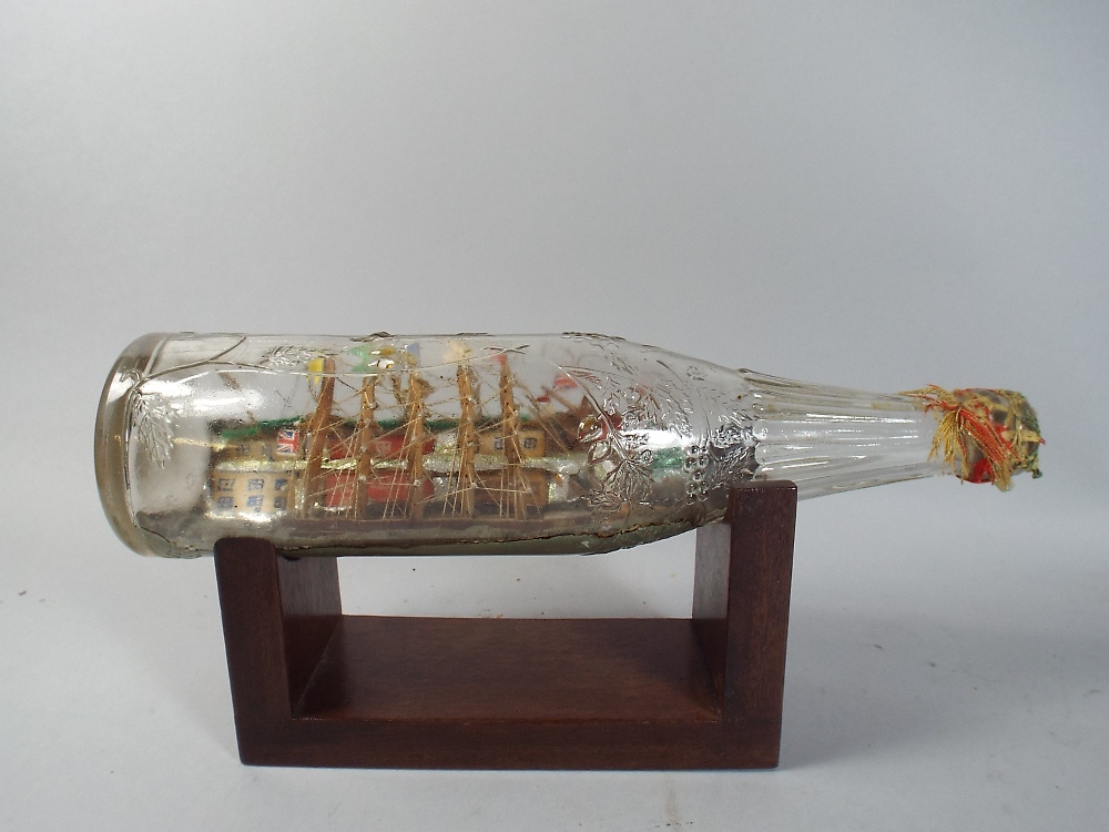 A Five Masted Ship in A Bottle.