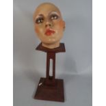 A Mannequin Girls Head Set on Art Deco Stand.