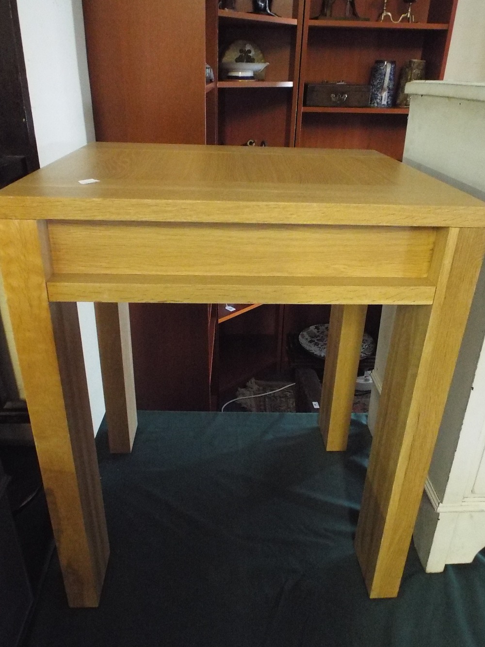 A Modern Square Topped Side Table.