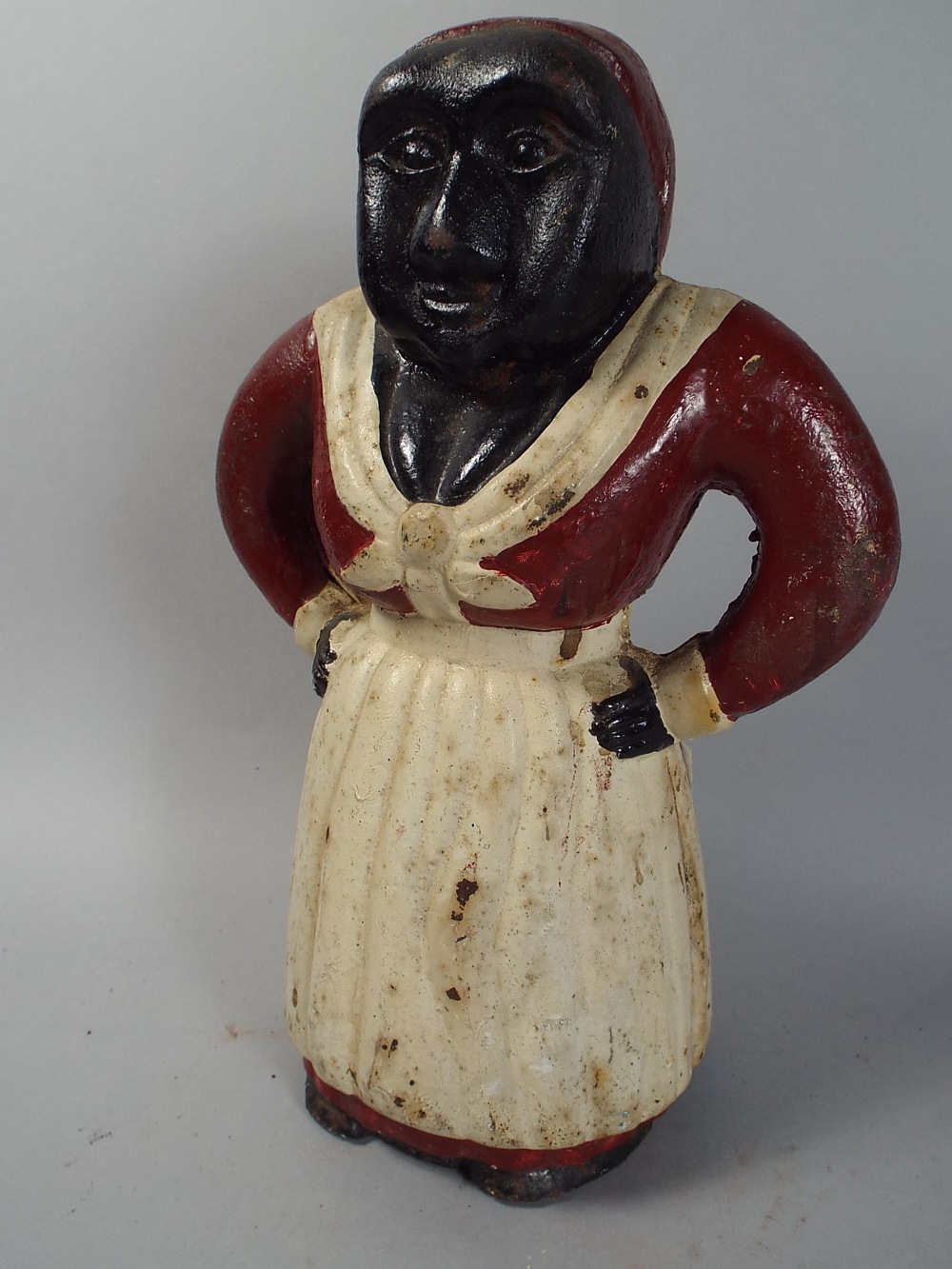 A Repro Cast Iron Money Box in The Form of American Lady.