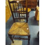 A 19th Century Oak Rush Seated Kitchen Chair.