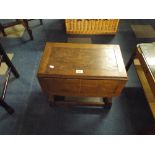 A Small Oak Drop Leaf Occasional Table.