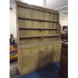 A Large Pine Dresser with Plate Rack to Top Drawers and Cupboard to Base.