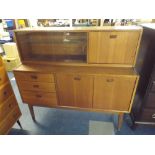 A 1970's Side Board with Cupboard and Drawer Base.