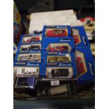 A Box Containing Various Auto Craft Cars Planes Trains Buses Etc.