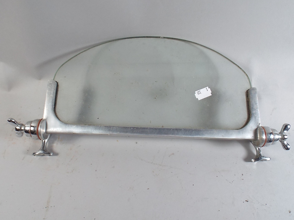 A Chromed Vintage Car Wind Deflector.