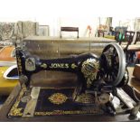 A Cased Jones Sewing Machine.