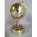 A 1960's Novelty Cigarette Dispenser in The Form of A Table Globe.