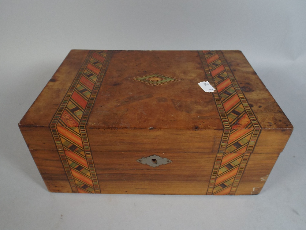 A Banded Walnut Ladies Workbox.