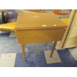 A Wooden Effect Drop Leaf Occasional Table.