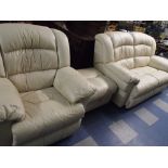 A Leather Arm Chair Two Seater Sofa and A Pouffe with Reclining Movement.