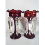 A Pair of Ruby Glass Lusters with Plain Droppers (Missing Two).