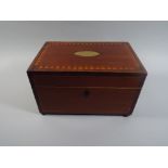 An Inlaid Mahogany Work Box with Oval Brass Escutcheon and Brass Lion Mask Ring Handles.