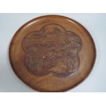 A Chinese Wooden Wall Plaque with Central Medallion Depicting Hills, Ocean and Lakes,