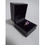 A Purple Amethyst and White Gemstone Stirling Silver Ring. Oval Cut Amethyst Approx 5ct.