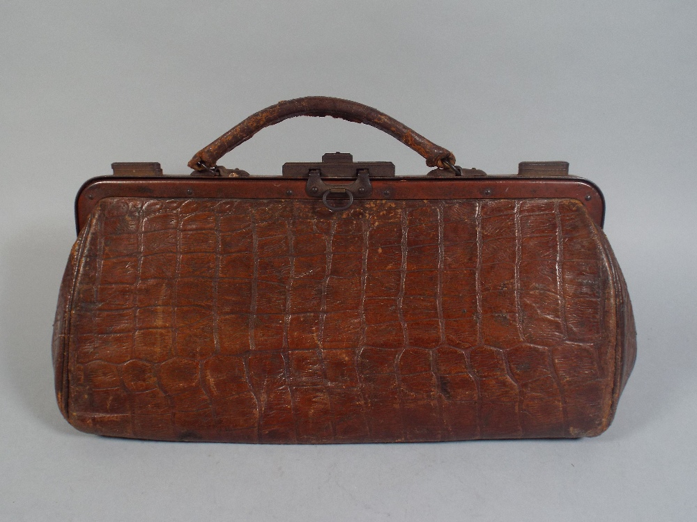 A 19th Century Leather Gladstone Bag. 38cm Long 17cm Tall.