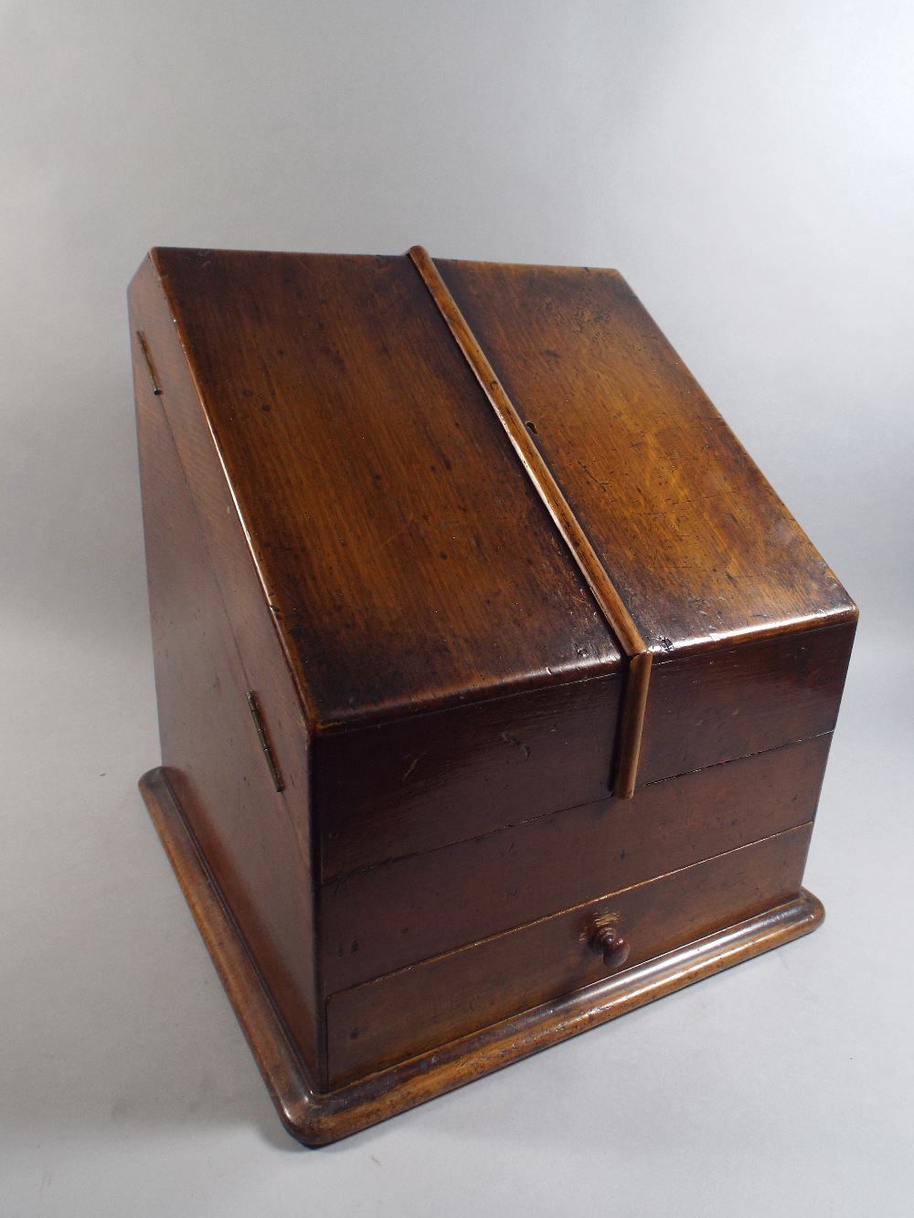 An Edwardian Oak Stationery Cabinet with Twin Doors to Fitted Interior and Base Drawers.