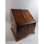 An Edwardian Oak Stationery Cabinet with Twin Doors to Fitted Interior and Base Drawers.