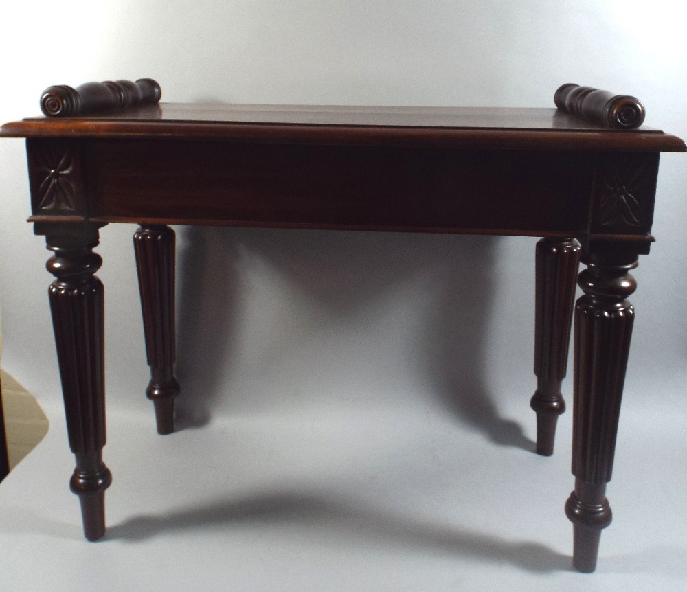 A 19th Century Country House Hall Bench, The Solid Plank Top with Bolster Ends.